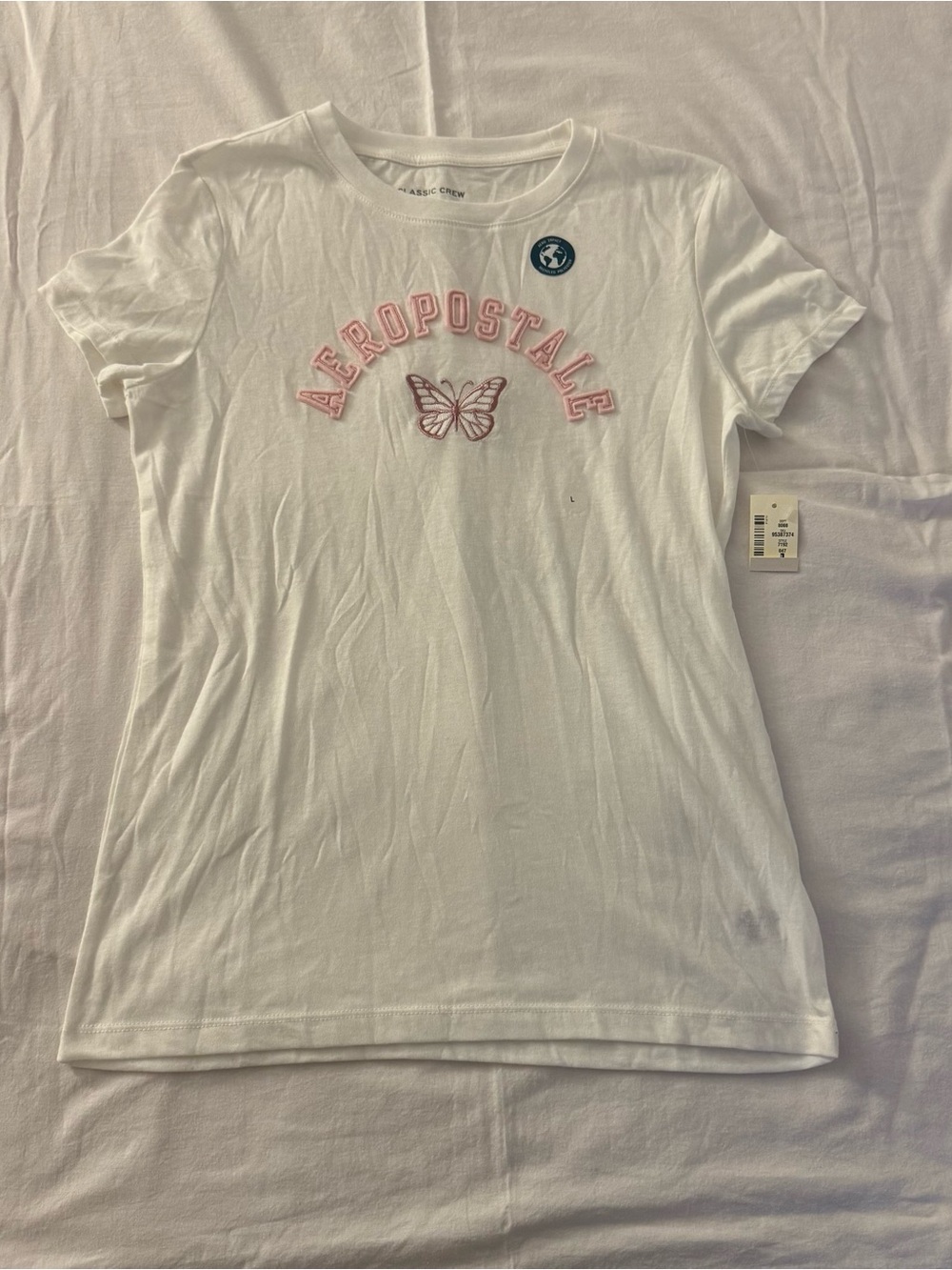 Aeropostale white butterfly fitted tee with pink butterfly graphic, size L